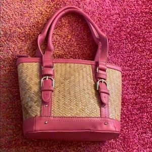 Small pink and wicker style purse